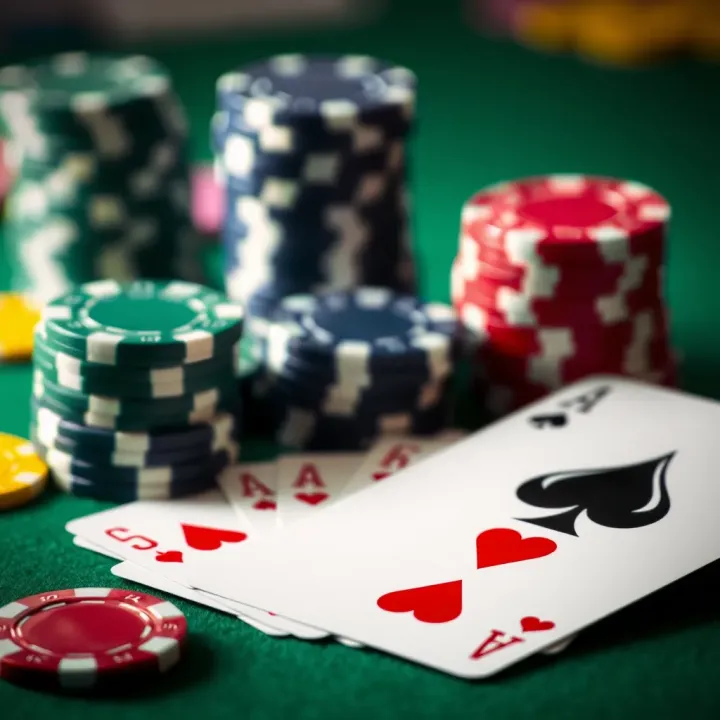 Casino chips and playing cards representing wagering conditions and game restrictions